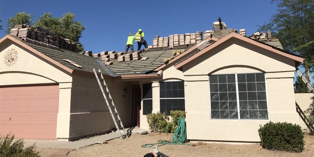 Contractors installing a new roof